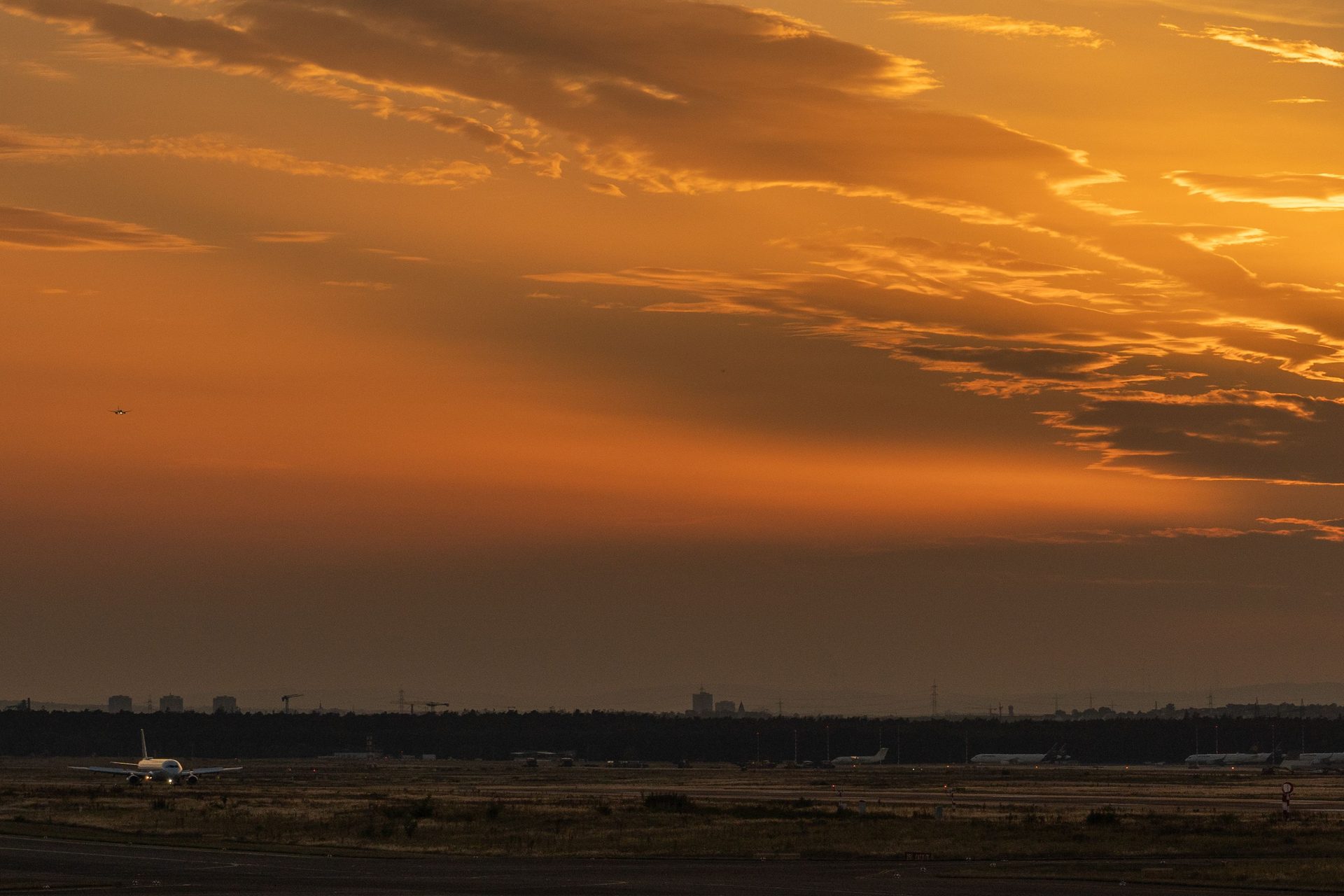 Airplane on the runway during golden hour